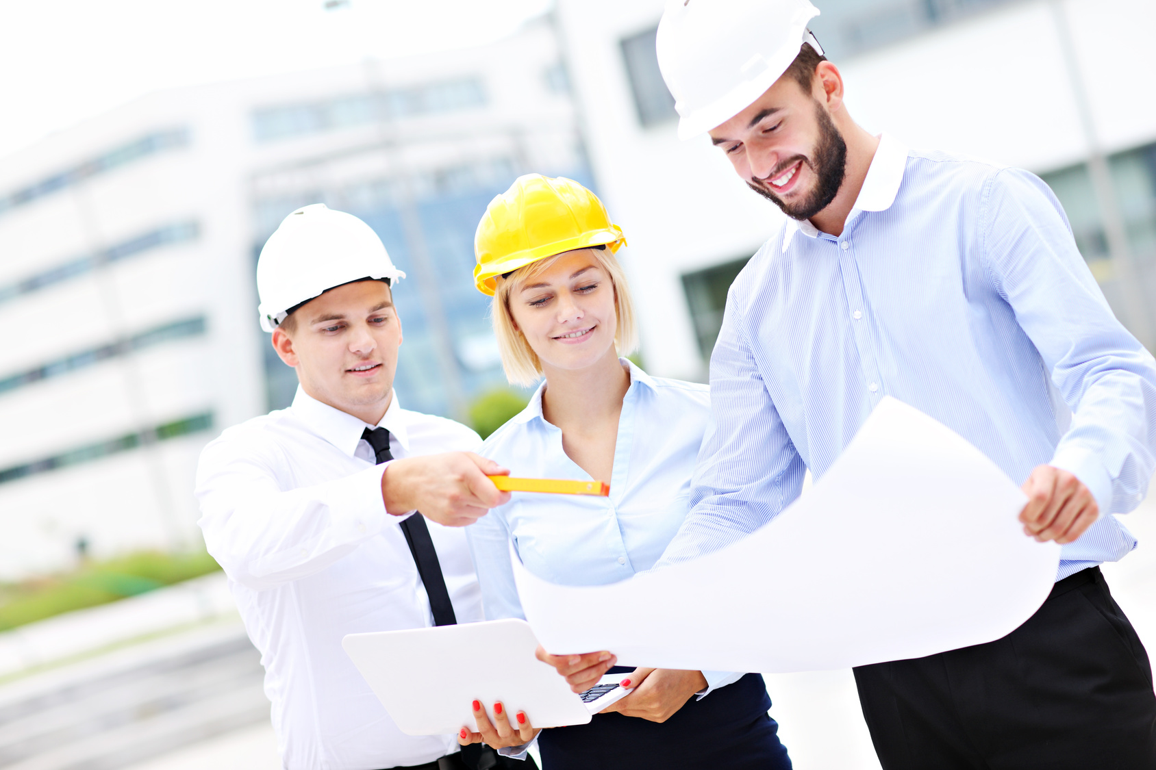 Group of young architects on site